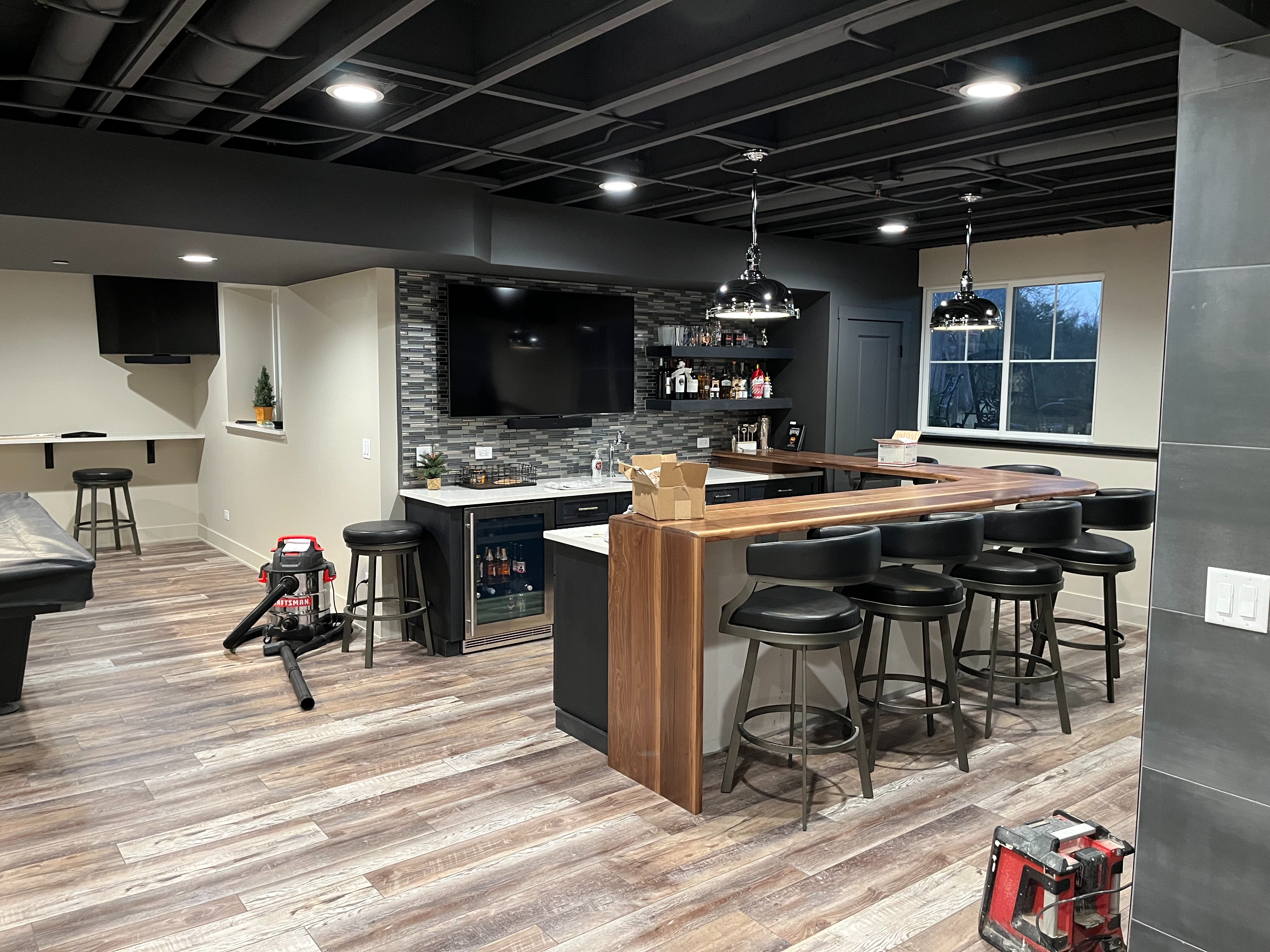 Basement remodel with bar